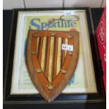 Framed Sporting Life American tennis themed cover plus a heraldic plaque