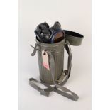 A German WWII era respirator with its metal container and stamp (various WWII dates),