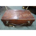 A vintage leather suitcase marked Sgt Jolliffe R.A. E.C.
