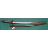 A WWII era shin-gunto sword and scabbard (matching numbers)