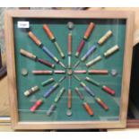 A modern cartridge display board containing a fine collection of 'small bore' shotgun cases,