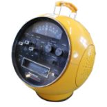 A Prinz sound stereo module SM8 eight track player in circular yellow plastic case,