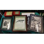 Four various shooting related prints (all framed and glazed) with two blackpowder tins