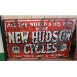 An enamel New Hudson Cycles sign,