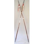 Two lances with red/white pennants and buff leather wrist straps