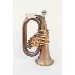 A copper and brass bugle by Boosey and Hawkes Ltd London