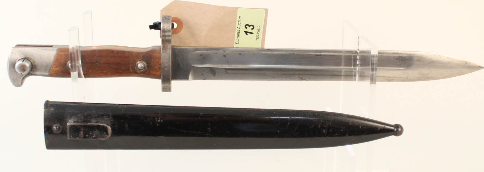 An Austrian M1895 knife bayonet with scabbard for the Mannlicher rifle