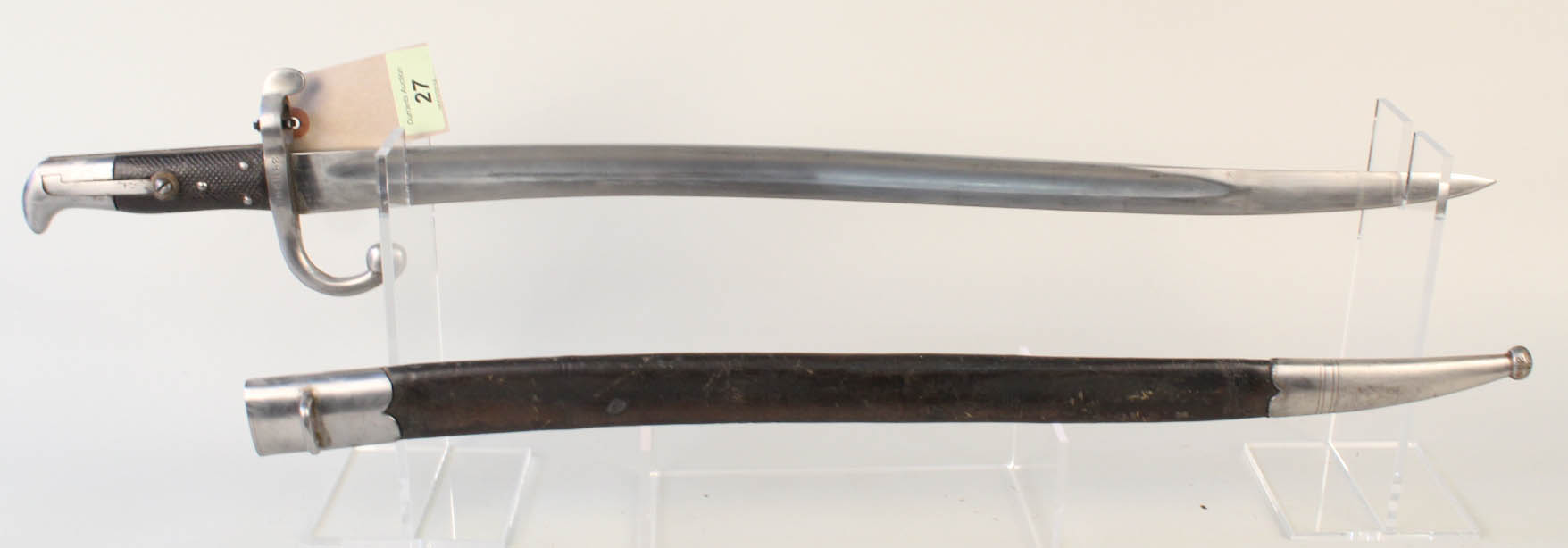 A Danish model 1867 sabre bayonet with leather scabbard