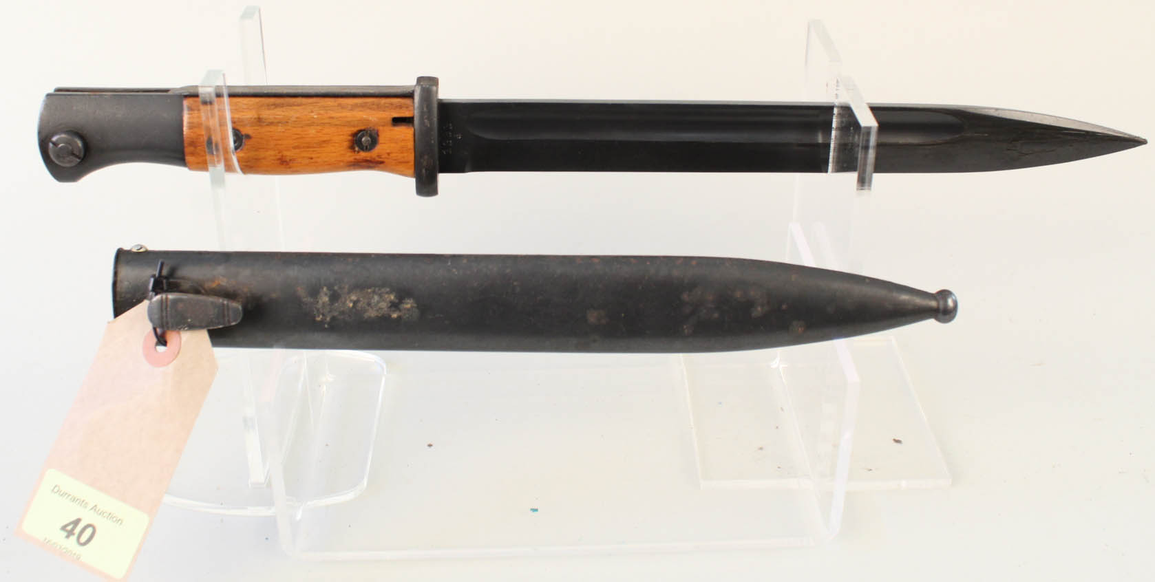 A Third Reich era 1884/98 model bayonet (wooden grips) with scabbard