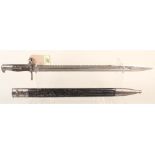 A Swiss model 1878 Vetterli Engineers sawback bayonet with leather scabbard