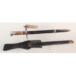 An Italian model 1891 bayonet with leather scabbard and frog