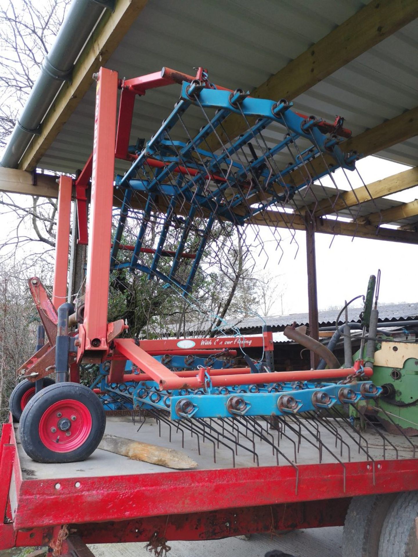 6 metre Opico grass harrow, hydraulic folding.