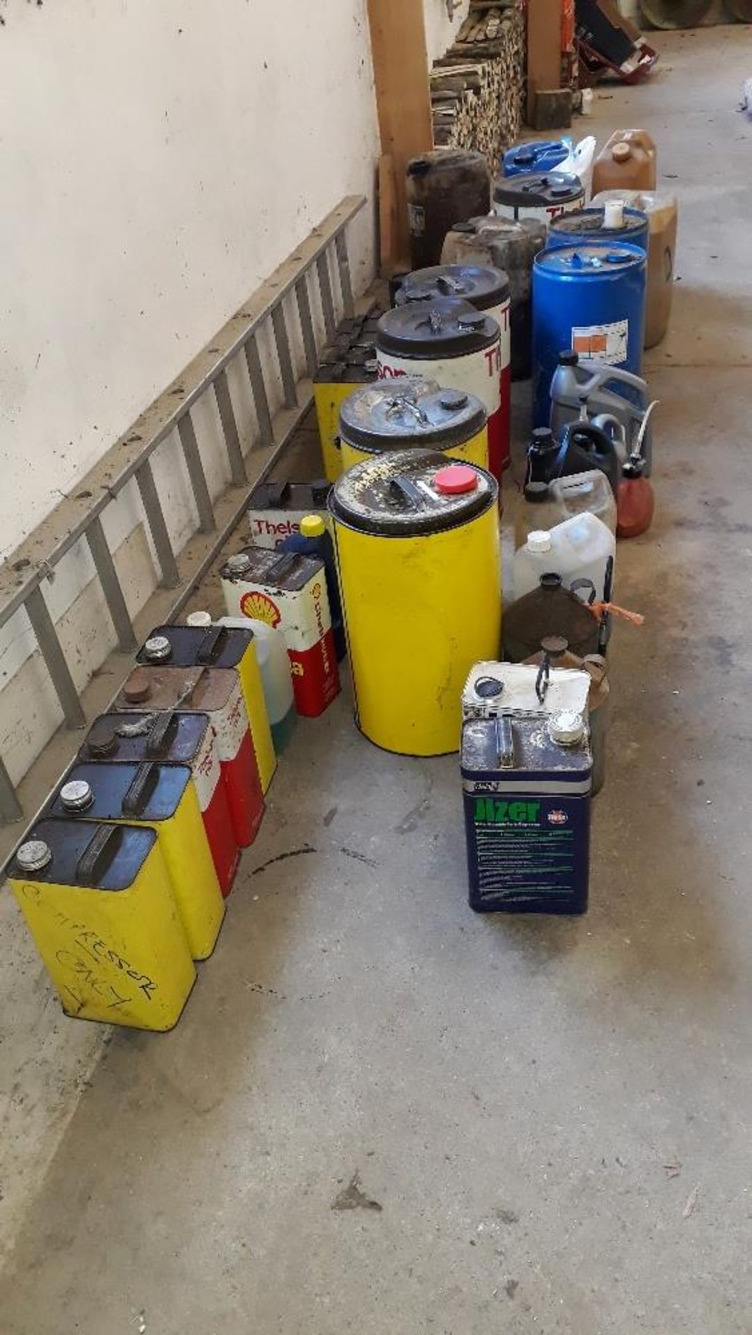 13 rectangular canisters of oil, 9 x large tubs of oil and 1 x diesel.