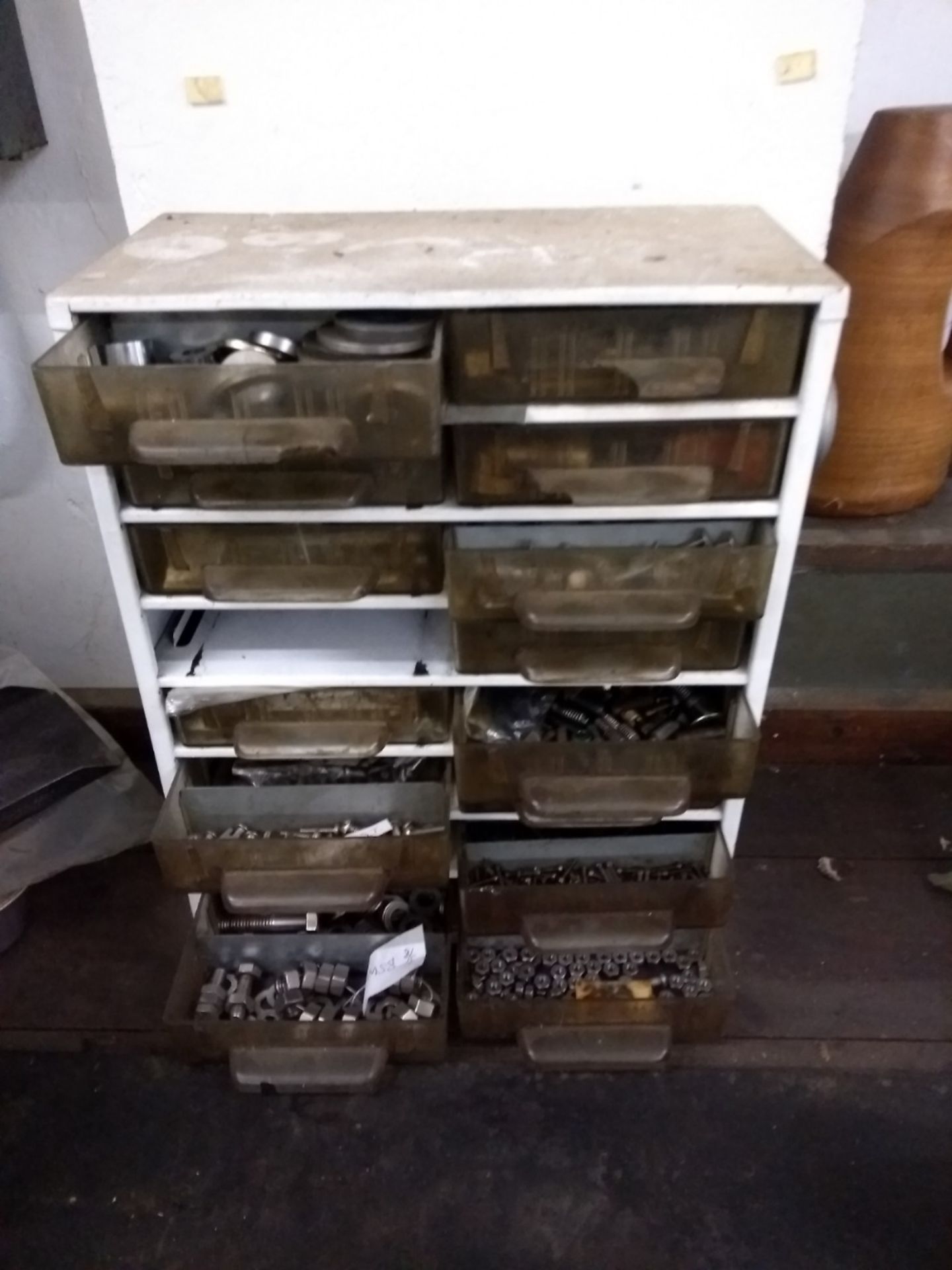Small set of 16 drawers with various taps, cap screws, nuts and bolts, washers,