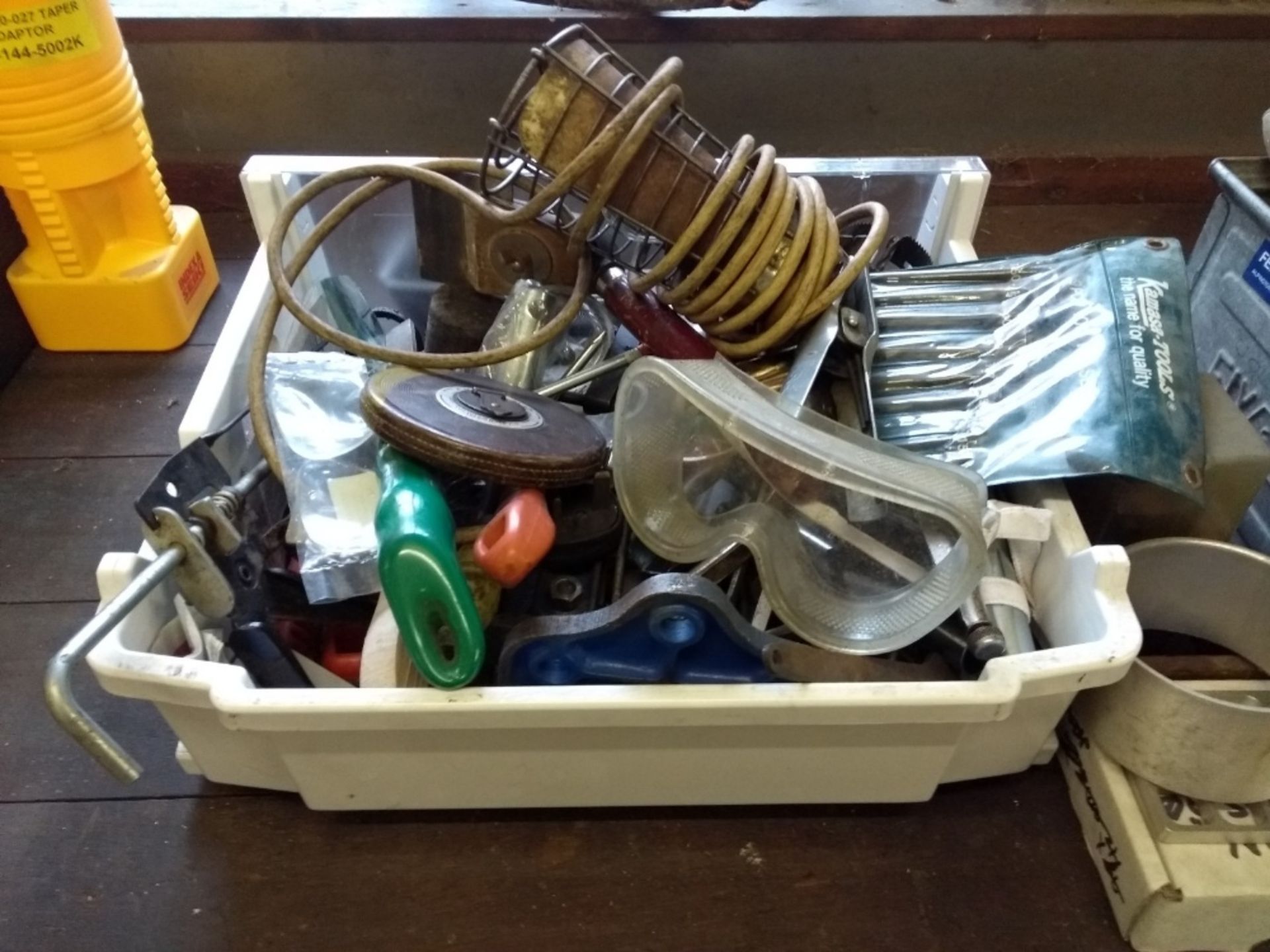 Box of files, spanners, grips, wraparound goggles, clamps, clip on lamp,