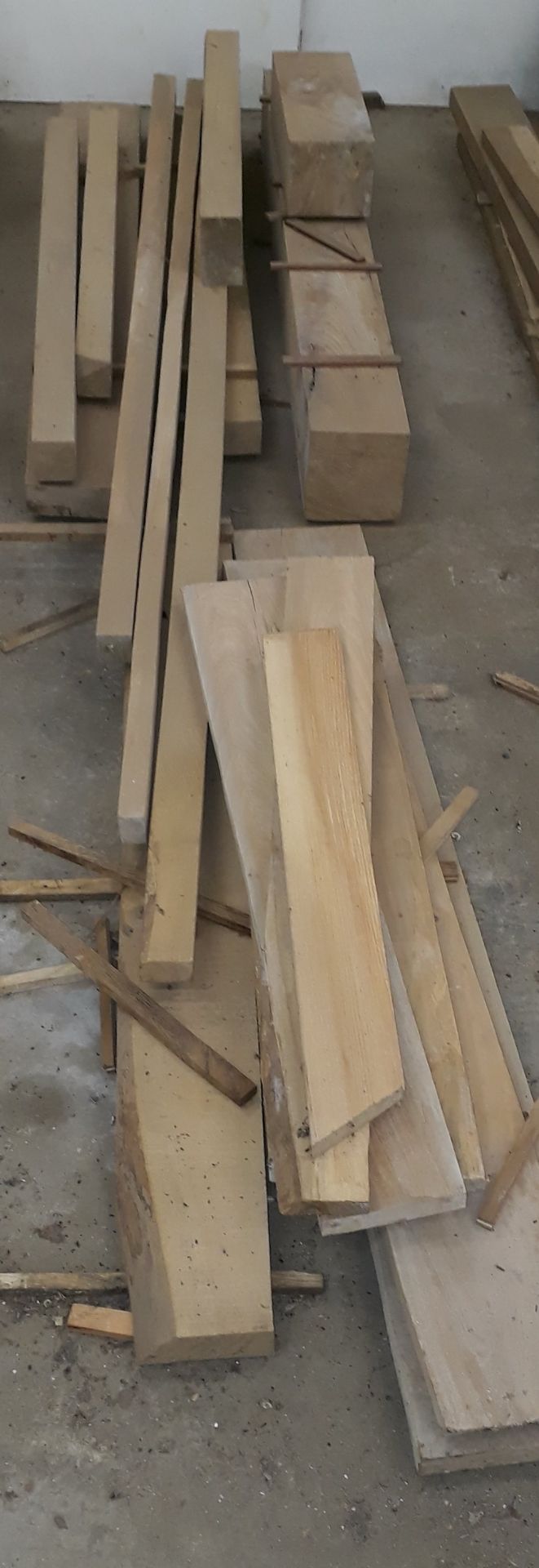 3 small heaps of cut and planed timber