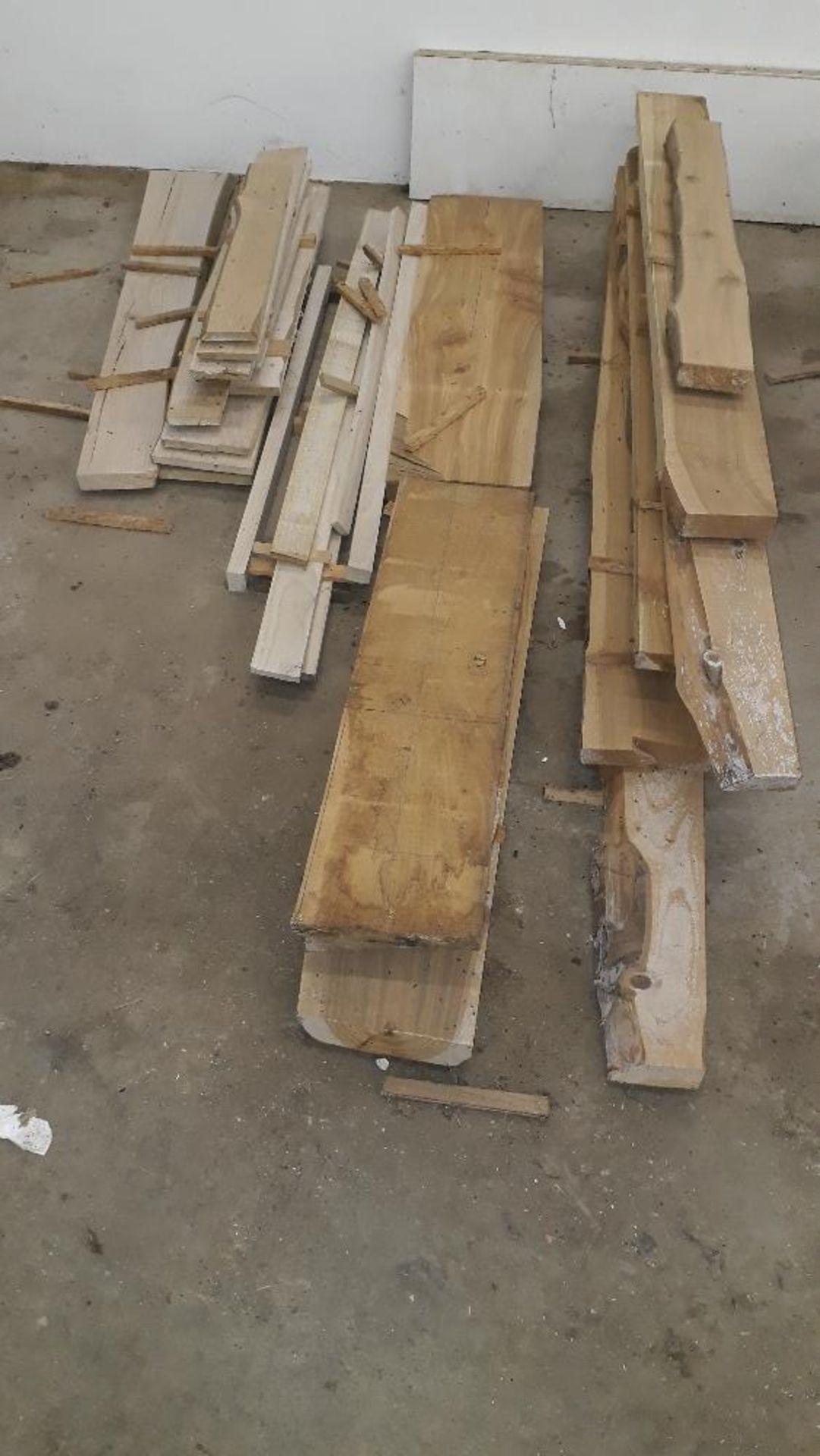 4 small heaps of cut and planed timber