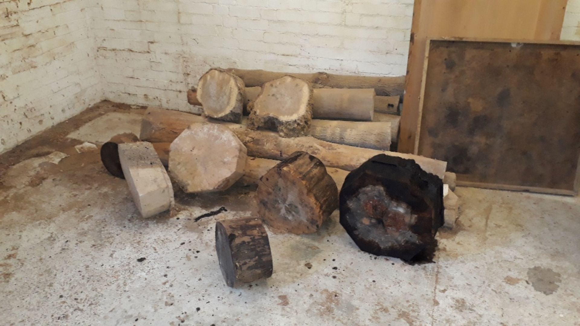 3 assorted heaps of timber on floor