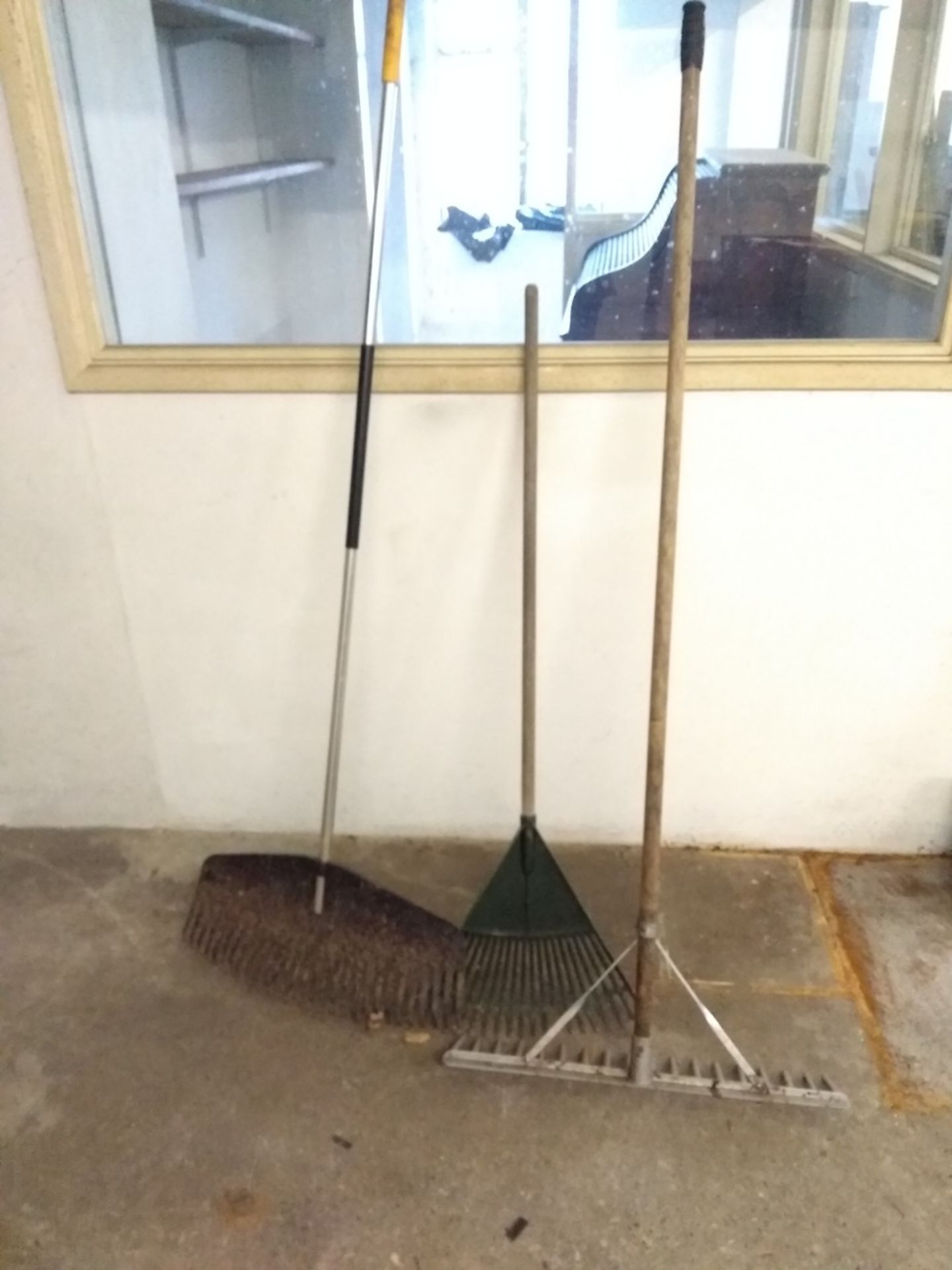 2 x plastic rakes with wooden handles 1 x metal rake
