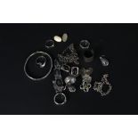 A quantity of silver jewellery including cufflinks, amber set earrings, rings,