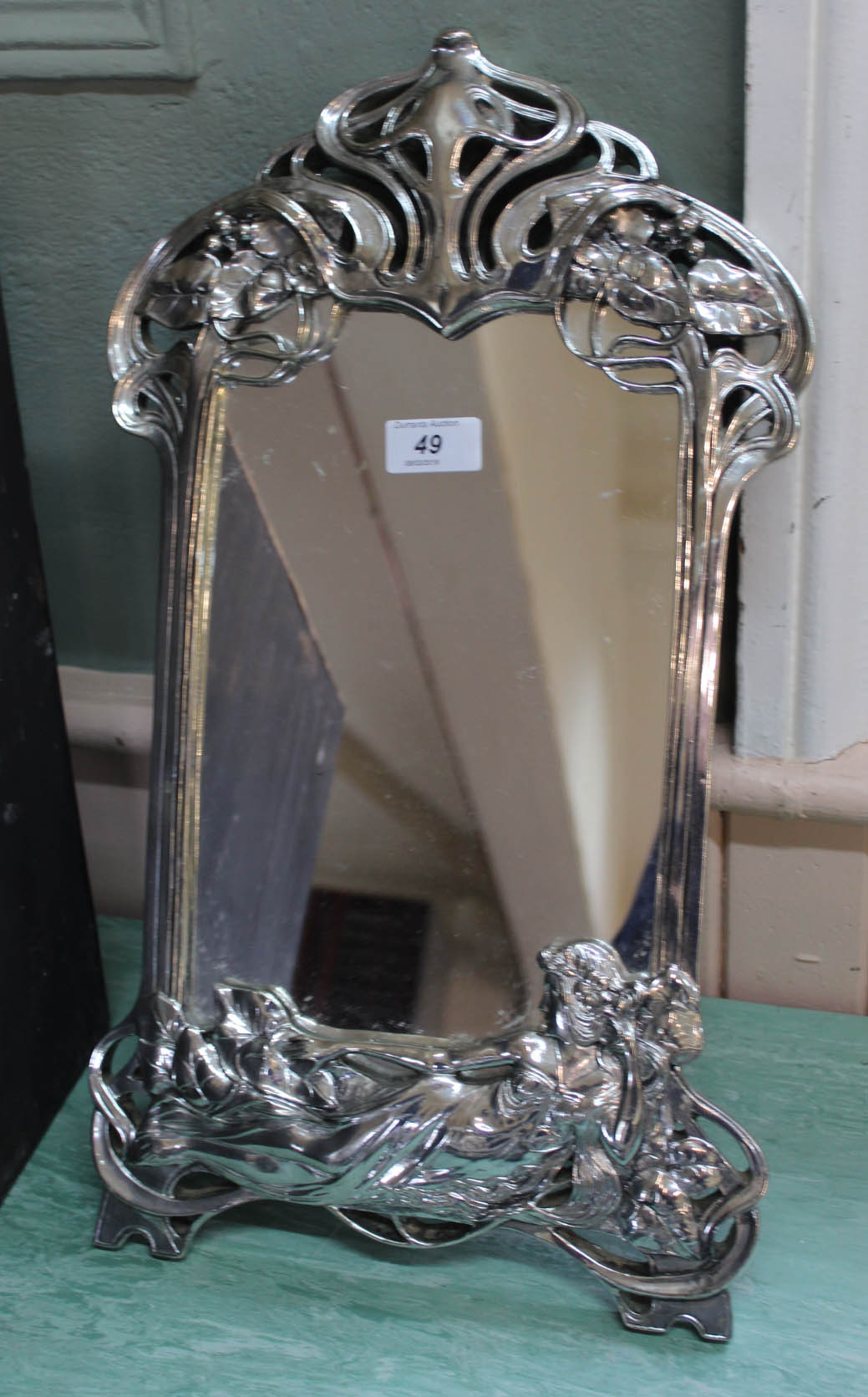 An Art Nouveau style easel mirror
