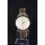 A gents 9ct gold Everite wristwatch with sub seconds dial on flexi strap