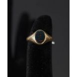 A small 18ct gold gents signet ring set with blood stone,