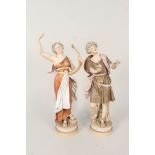 A pair of Royal Dux classical figurines (some restoration)