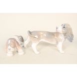 Two Lladro dogs