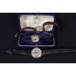 Three 9ct gold cased ladies watches, all on leather straps,