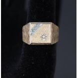 A 9ct gold gents bark effect signet ring set with white stones,