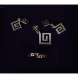 A 14ct gold Greek key design suite comprising of a ring,