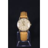 A gents 9ct gold Smiths Astral wristwatch with sub seconds dial on leather strap