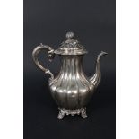 A large Victorian silver melon fluted coffee pot with cast floral finial by Joseph Albert Horace &