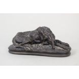 A bronze seated wolfhound,