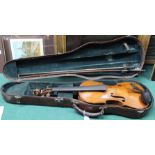 A cased violin and bow,