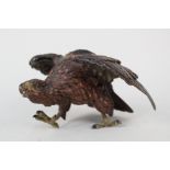 A cold painted bronze eagle pen wiper,