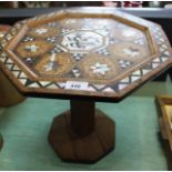 An Islamic octagonal inlaid and mother of pearl table