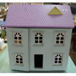 A dolls house and furniture