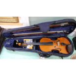 A cased German violin c1900 plus two bows