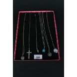 Six various silver pendants including heart shaped locket, stylised stone set cross,
