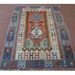 A flat weave geometric rug,