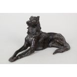 A bronze seated wolfhound,