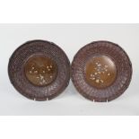 A pair of Japanese basket weave plates, the bronze centres with yellow metal inlays,