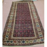 A Persian rug with multiple geometric designs,