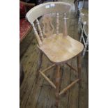 A modern pine bar stool