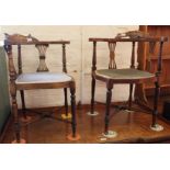 A matched pair of Edwardian inlaid mahogany corner chairs