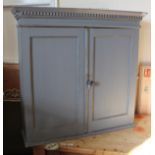 A 19th Century dove grey painted pine two door cupboard with shelved interior