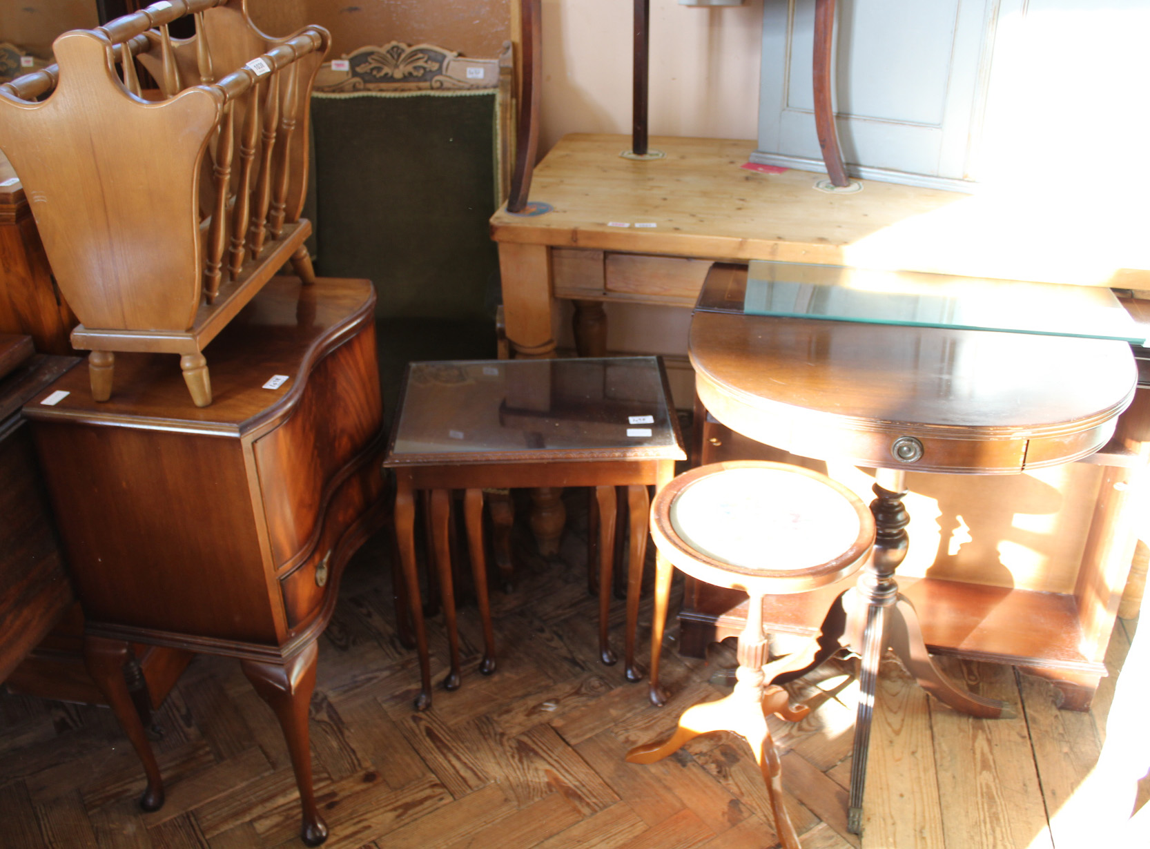 A selection of reproduction mahogany furniture and a magazine rack