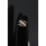 A 9ct gold sapphire and diamond set ring,